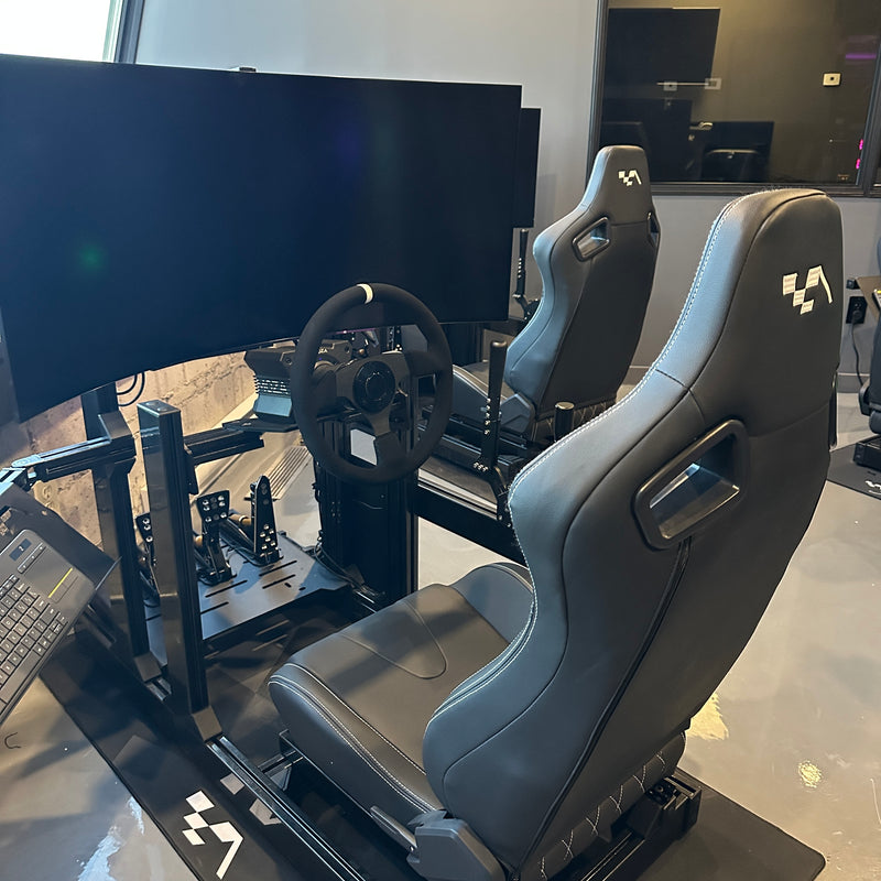 The Pit Lane Room | 4 Simulators for Group Rentals
