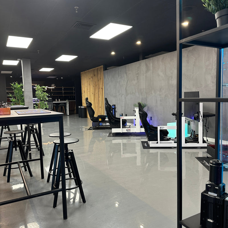 The Advanced SimRacing Experience | Entire Space & 9 Simulators for Group Rentals